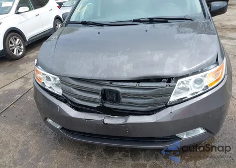 2013 Honda Odyssey Touring z USA, uszkodzony, nr VIN 5FNRL5H94DB013310